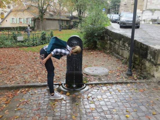 Taking a sip from one such fountain like the real Swiss do.