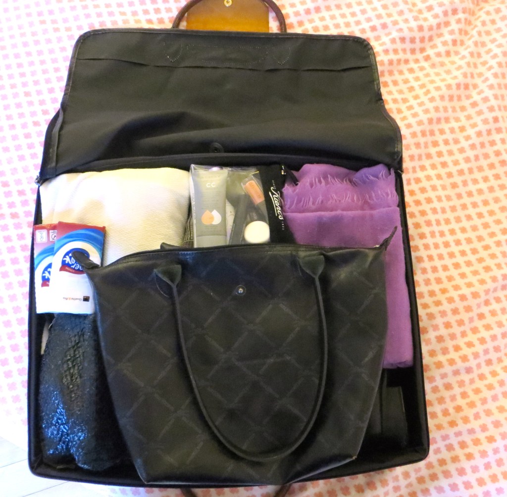 My trust Longchamp suitcase makes the carry-on cut. http://bit.ly/1CdpWHF